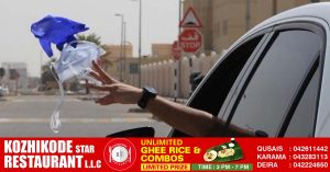 Abu Dhabi police issue fine of 1000 dirhams and 6 black points for littering while driving