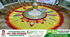 400 health workers from 12 countries prepared giant onam flowers in UAE.