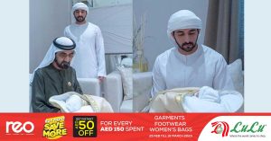 Grandfather His Highness Sheikh Mohammed bin Rashid Al Maktoum holding the third child of the Crown Prince of Dubai