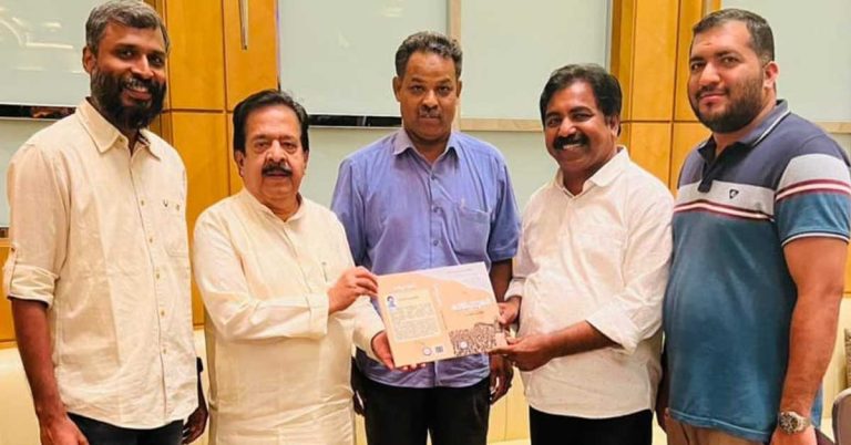 Ramesh Chennithala Punnakan released the cover of Muhammadali's 5th book "Footprints".