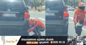 A delivery boy rescued a kitten trapped under a vehicle in Abu Dhabi