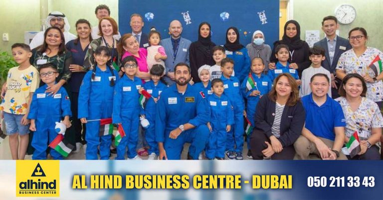 UAE astronauts visit children suffering from cancer.