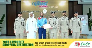 Sharjah Police honored a taxi driver who handed over a passenger's forgotten phone to the police.